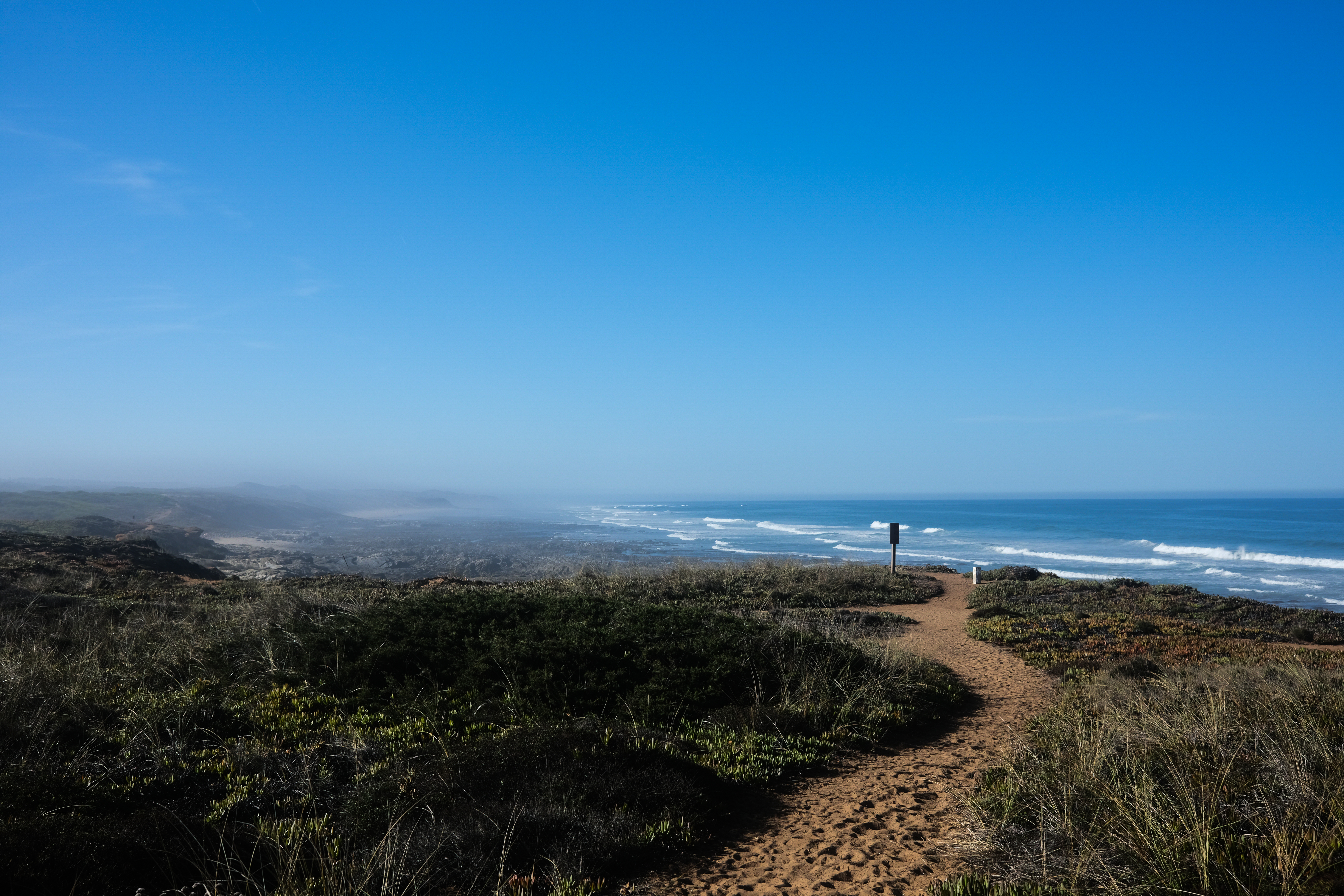 Coastal cliffs and blue ocean